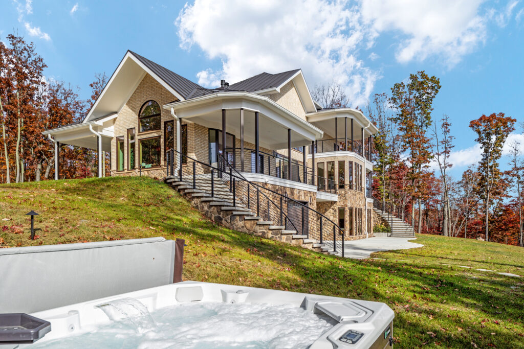 The Vale luxury cabin exterior with fall foliage and mountain views, Lost River West Virginia
