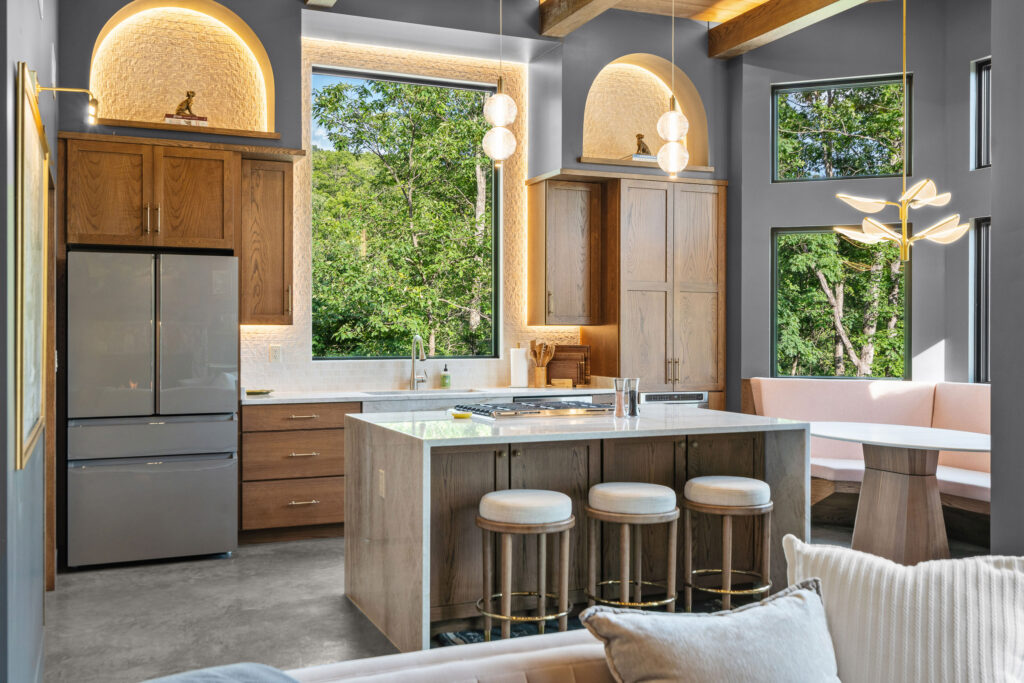 Island seating in the kitchen at The Nook with a wonderful view of the surrounding nature.